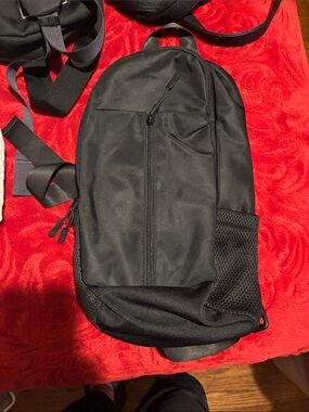 Original Use Black Men’s Sling Bag with Mesh Side Pocket